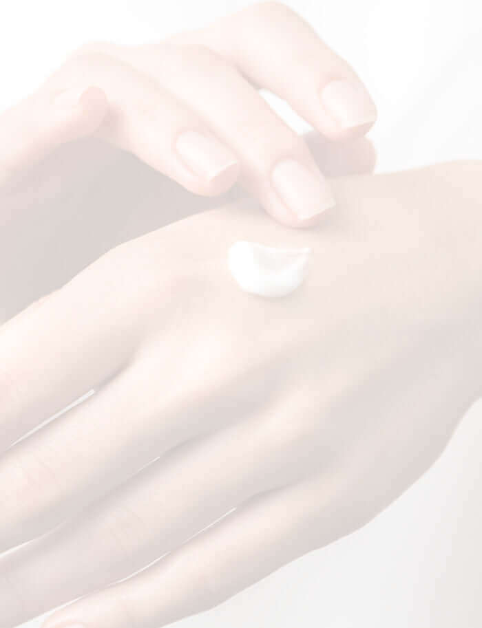 Luxury hand creams being massaged into hands