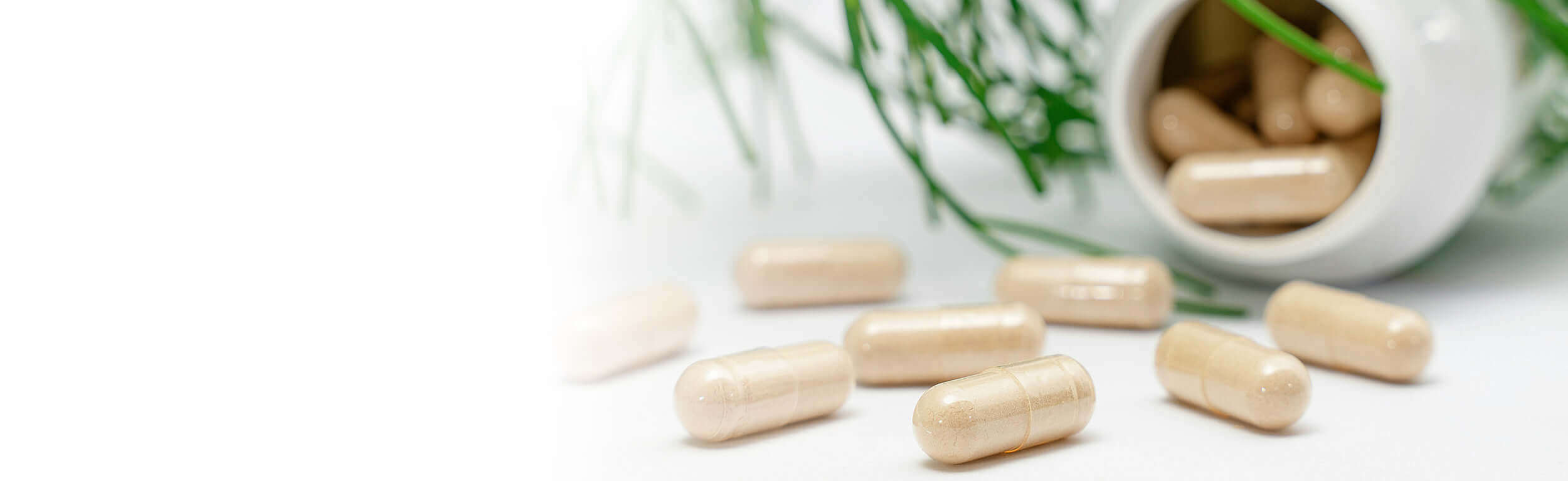 Capsules spilling from a pot