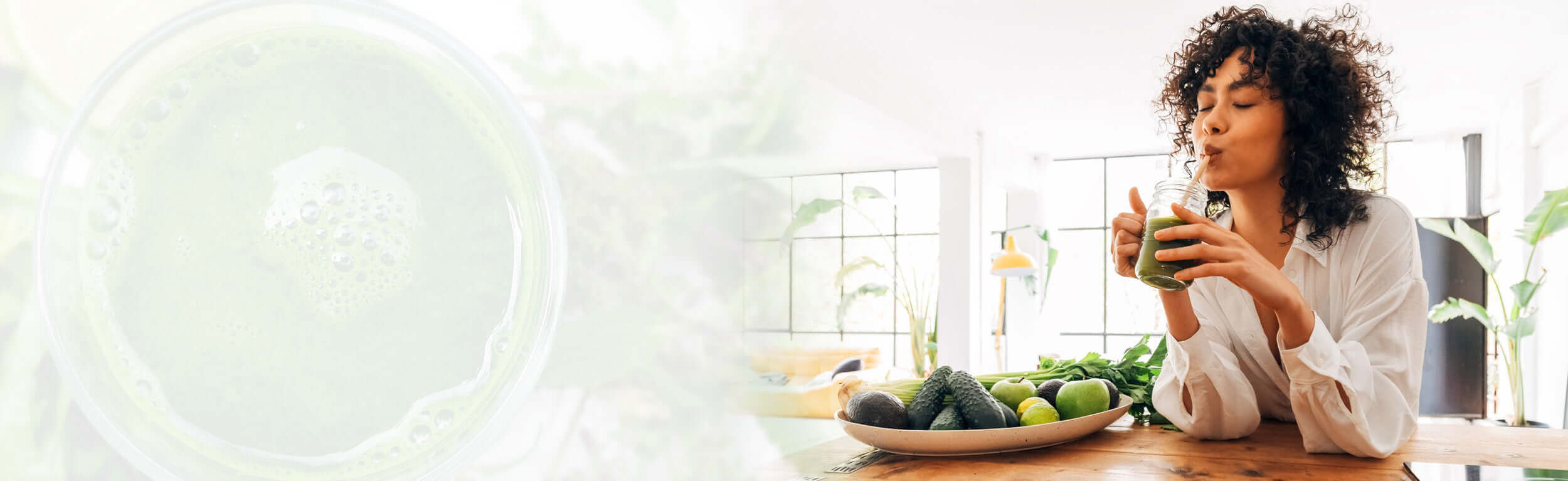 lady drinking a detoxing, green juice