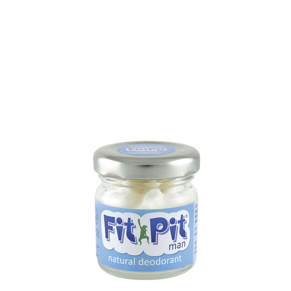 A glass jar with a metal lid containing Fit Pit natural deodorant for men, labeled as organic and vegan-friendly.