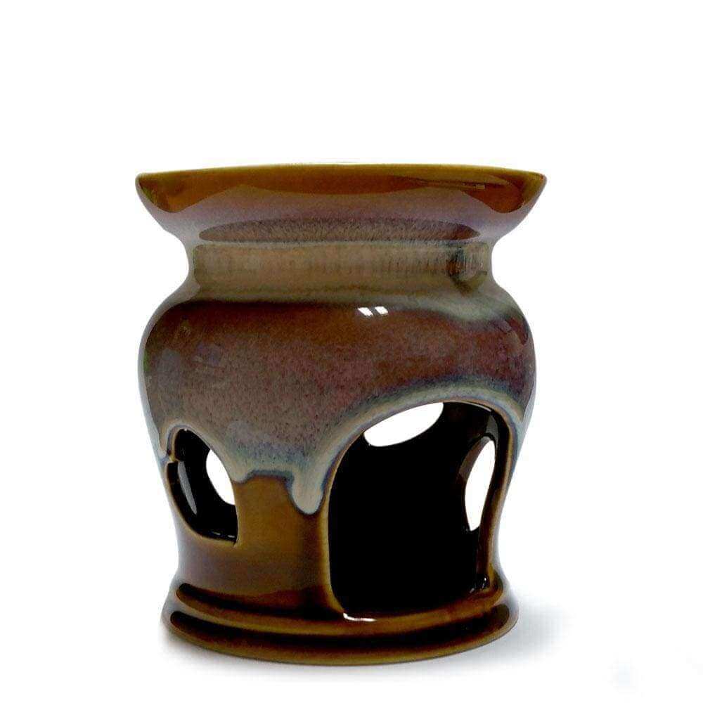 Brown ceramic heart-shaped essential oil burner with cut-out designs
