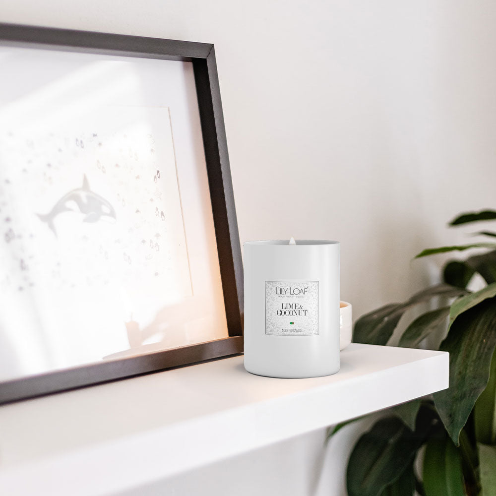 Lime & Coconut Soy Wax Candle sitting on lounge mantle