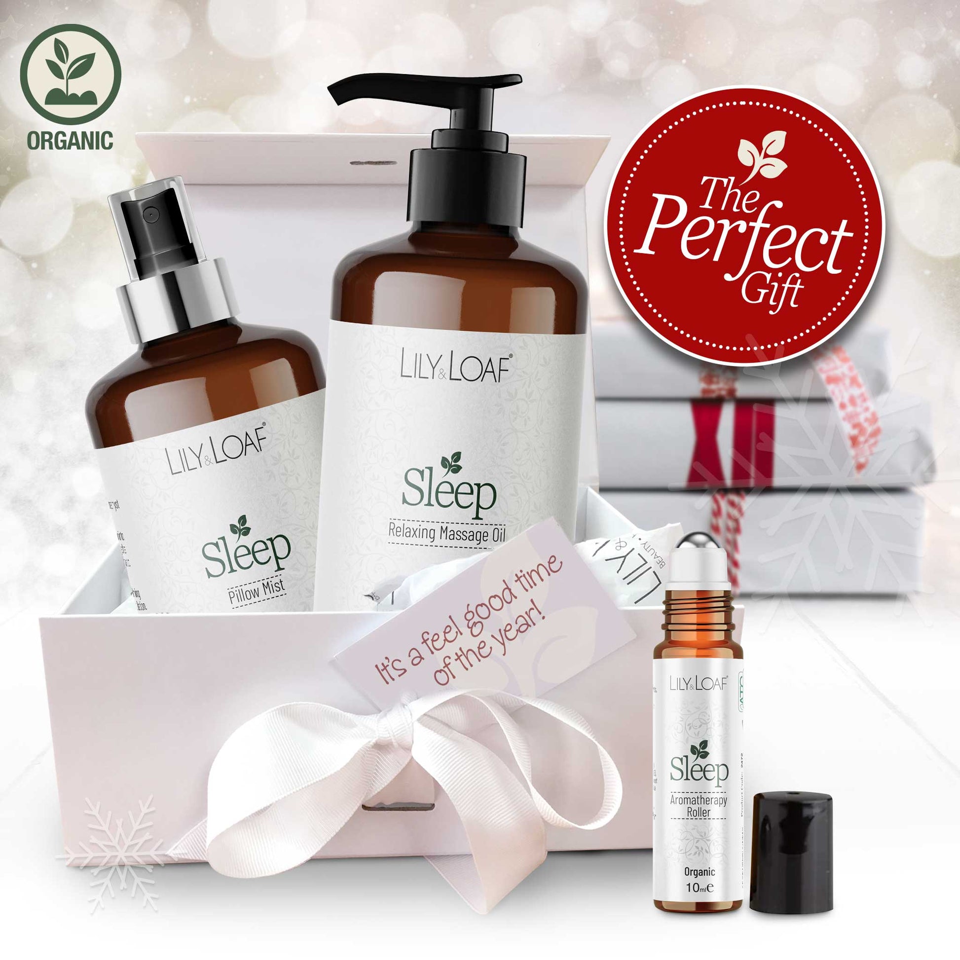 Lily & Loaf sleep product set with massage oil, pillow mist, and roller bottle on a white background.