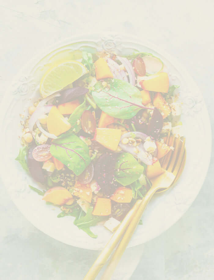 Mobile version of a healthy salad with gold cutlery