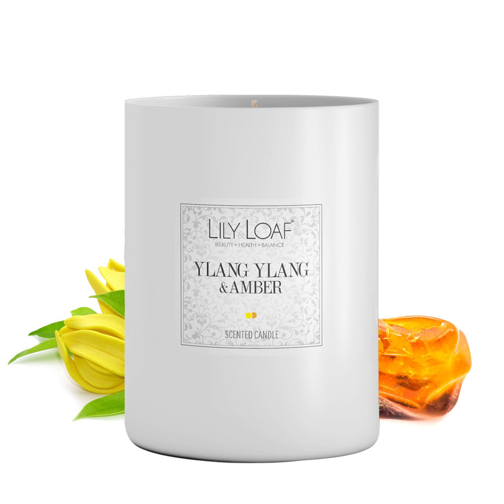 Ylang Ylang & Amber Soy Wax Candle with ingredients behind