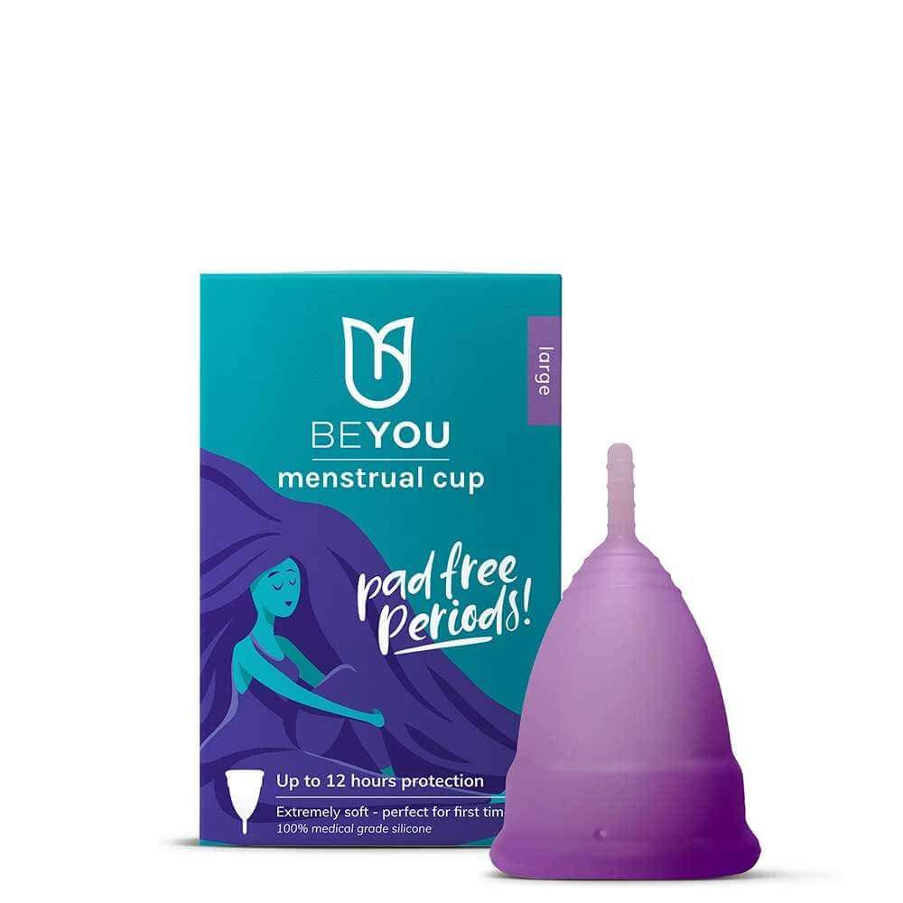 BeYou Menstrual Cup (Large) with teal and purple packaging promoting 12-hour protection, pad-free periods, and soft silicone for first-time users